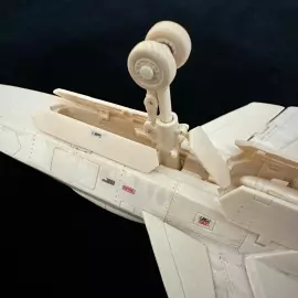 A composite model of the SU-57 mammoth tusk aircraft on a stand